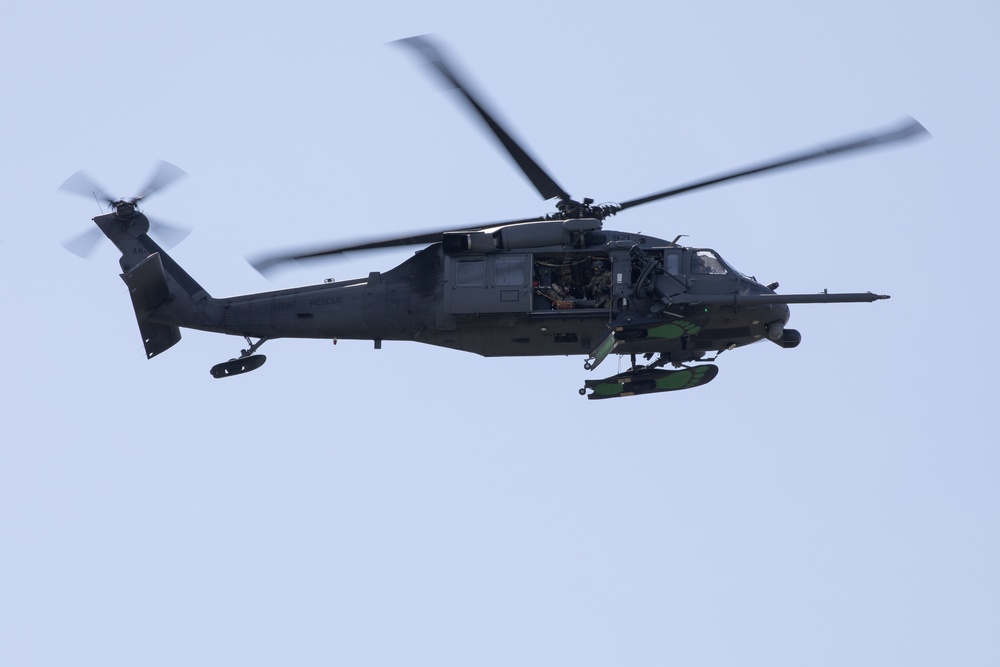 Alaska Air National Guardsmen showcase rescue demonstration during multi-agency hoist symposium