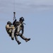 Alaska Air National Guardsmen showcase rescue demonstration during multi-agency hoist symposium