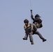Alaska Air National Guardsmen showcase rescue demonstration during multi-agency hoist symposium