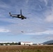 Alaska Air National Guardsmen showcase rescue demonstration during multi-agency hoist symposium
