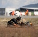 Alaska Air National Guardsmen showcase rescue demonstration during multi-agency hoist symposium