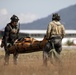 Alaska Air National Guardsmen showcase rescue demonstration during multi-agency hoist symposium