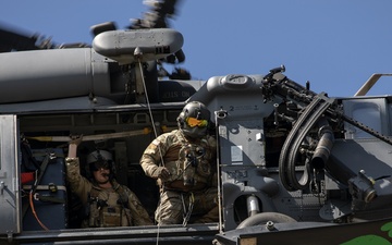 Alaska Air National Guardsmen showcase rescue demonstration during multi-agency hoist symposium