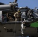 Alaska Air National Guardsmen showcase rescue demonstration during multi-agency hoist symposium