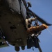Alaska Air National Guardsmen showcase rescue demonstration during multi-agency hoist symposium
