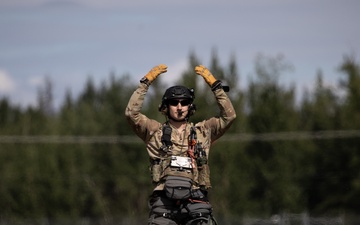 Alaska Air National Guardsmen showcase rescue demonstration during multi-agency hoist symposium