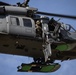 Alaska Air National Guardsmen showcase rescue demonstration during multi-agency hoist symposium