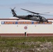 Alaska Air National Guardsmen showcase rescue demonstration during multi-agency hoist symposium
