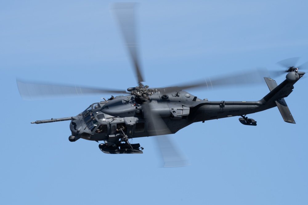 Alaska Air National Guardsmen showcase rescue demonstration during multi-agency hoist symposium