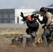 Alaska Air National Guardsmen showcase rescue demonstration during multi-agency hoist symposium