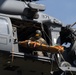 Alaska Air National Guardsmen showcase rescue demonstration during multi-agency hoist symposium