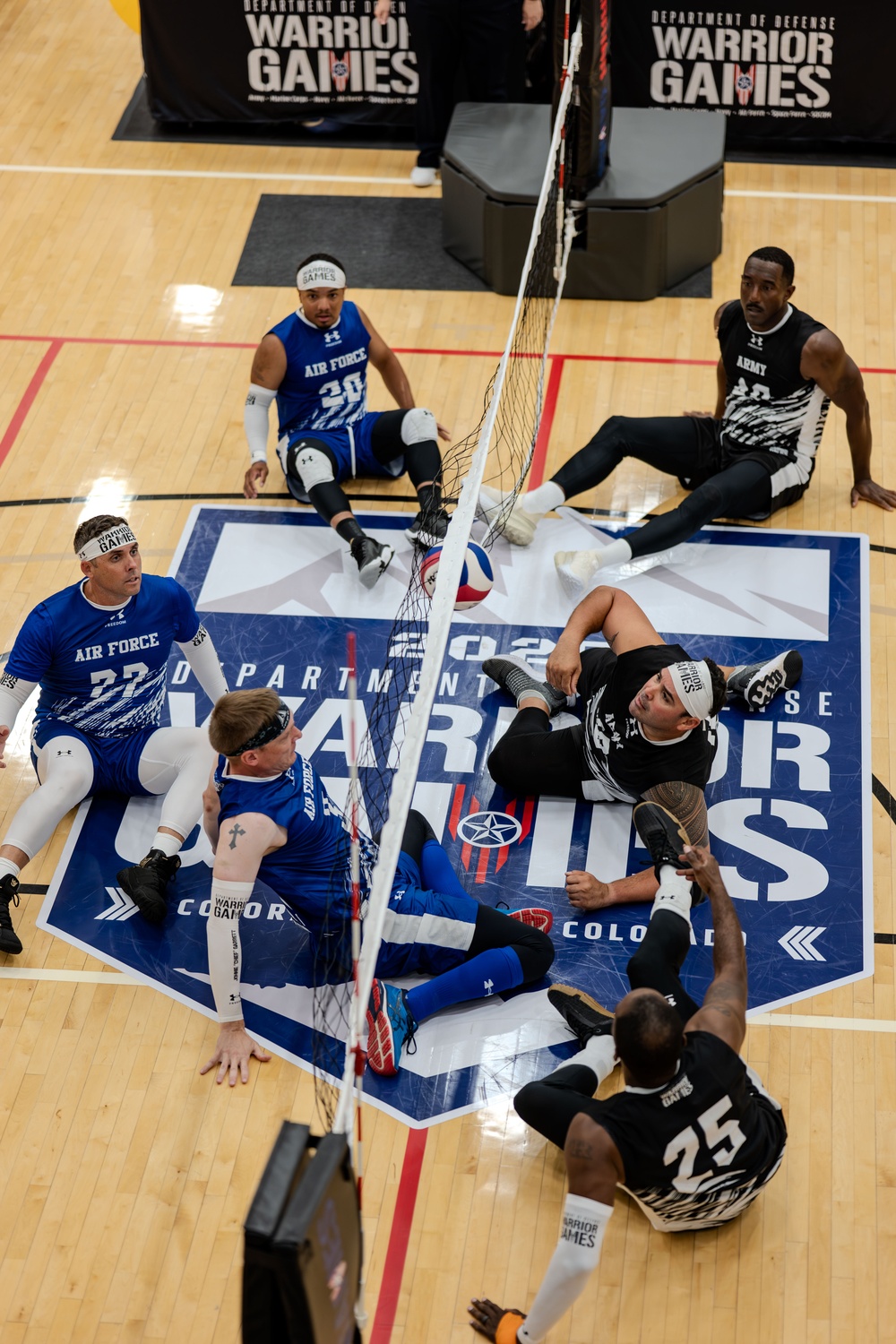 Air Force Warrior Games Athletes compete in sitting volleyball