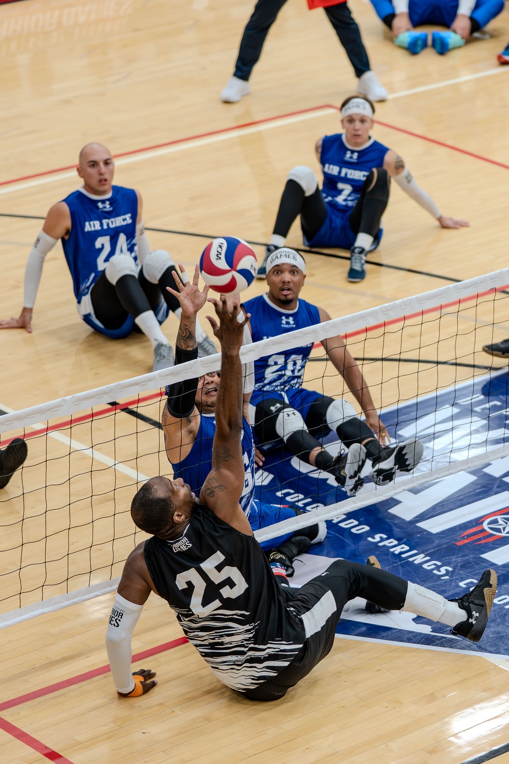 Air Force Warrior Games Athletes compete in sitting volleyball