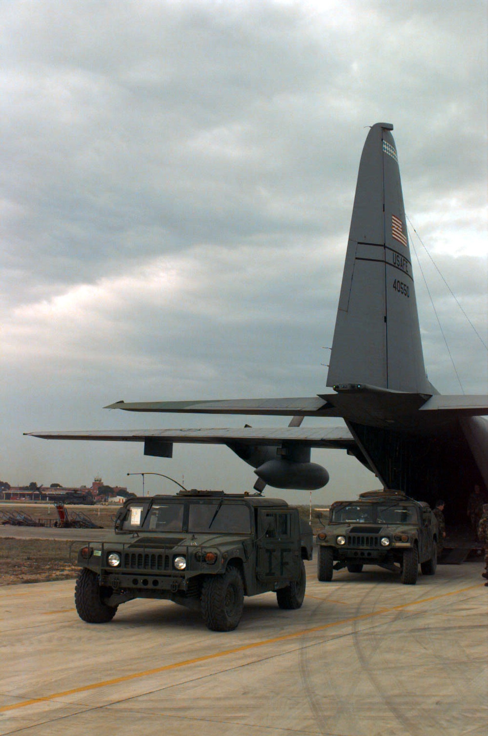 U.S. Army Humvee's are loaded into a U.S. Air Force C-130 for Sarajevo