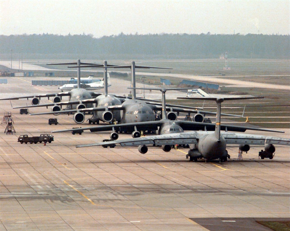 C-17 Globemasters and C-141 Starlifters on the ramp at Rhein-Main Air Base, Germany.