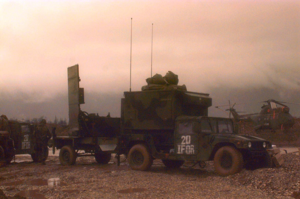 U.S. Army soldiers set up a AN/TPQ-36 Fire Finder Radar in Sarajevo, Bosnia and Herzegovina.