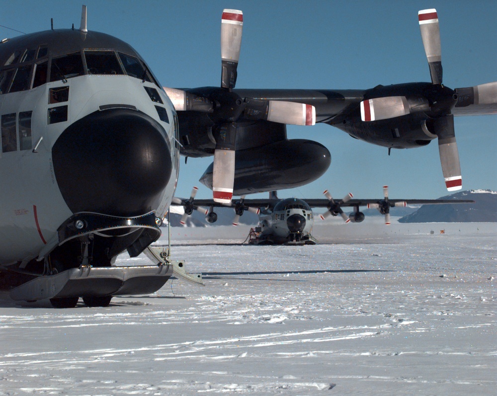 U.S. Navy LC-130 Hercules ski-equipped cargo plane prepares to take off from Shackleton Glacier, Antarctica.