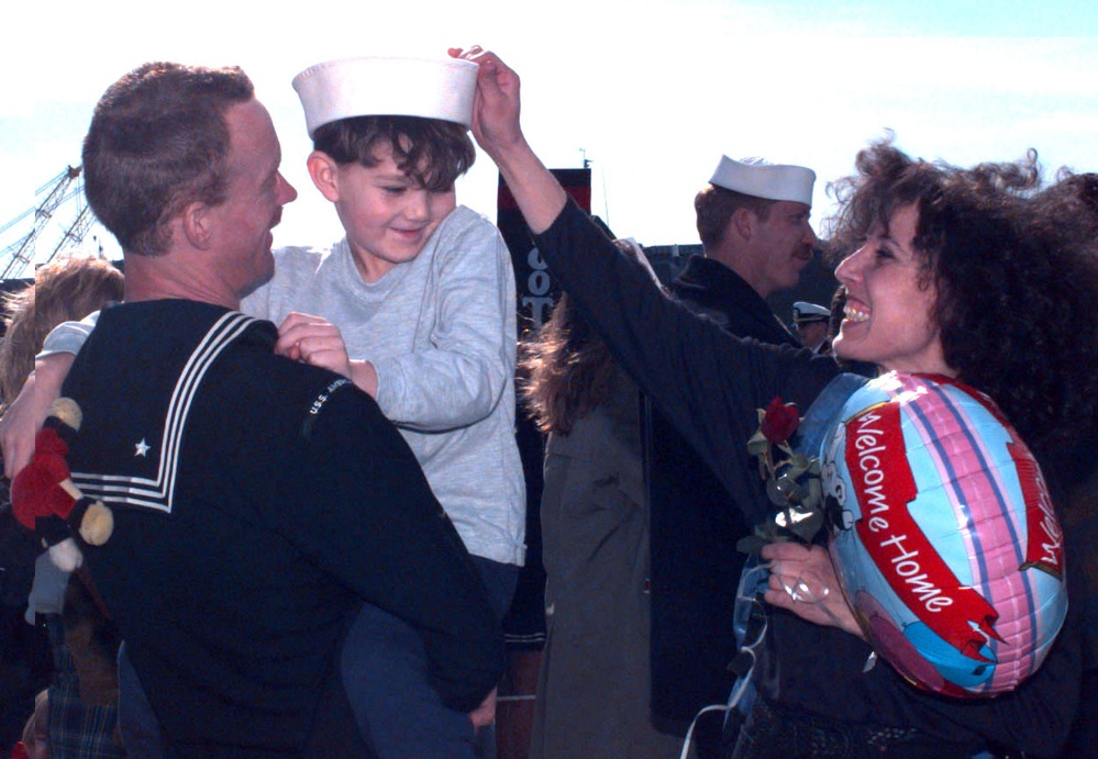 Families are re-united when the USS America (CV 66) returns to Norfolk, Va.