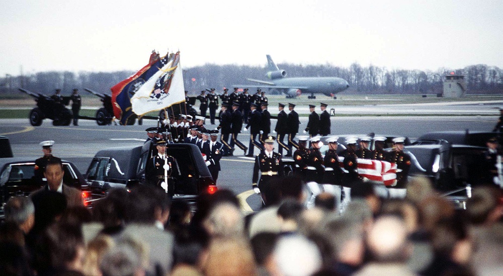 Honor Guard carries the remains of those killed on the  Commerce mission to Bosnia and Herzegovina.