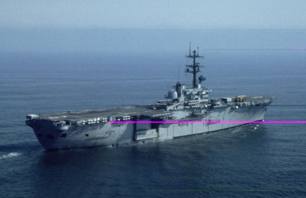 USS Guam sails for Liberia to evacuate U.S. citizens under Operation Assured Response.