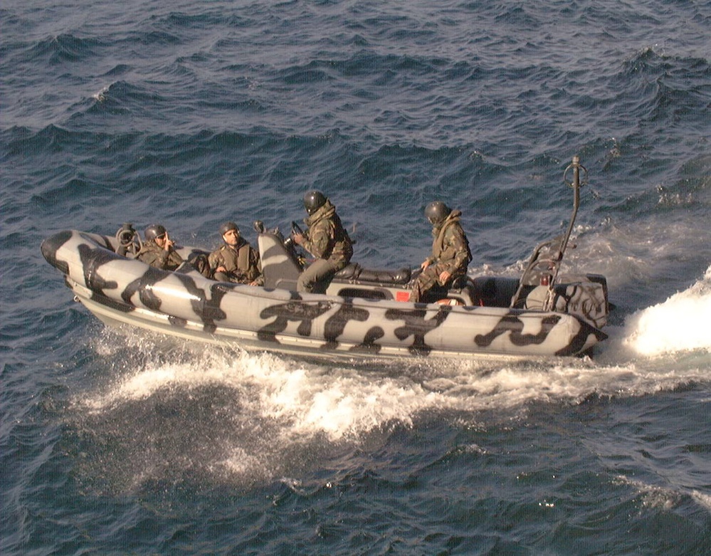 U.S. Navy SEAL's deploy from the USS Chinook in Zodiac RIB boats.
