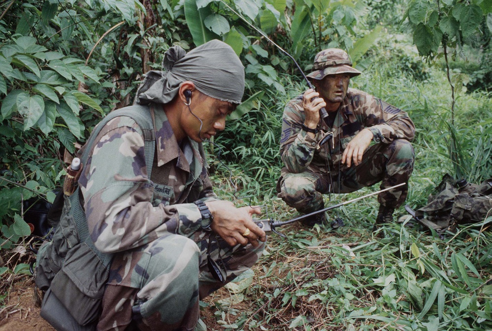 Royal Thai and U.S. Air Force communicate on a PRC-90 HF Radio.