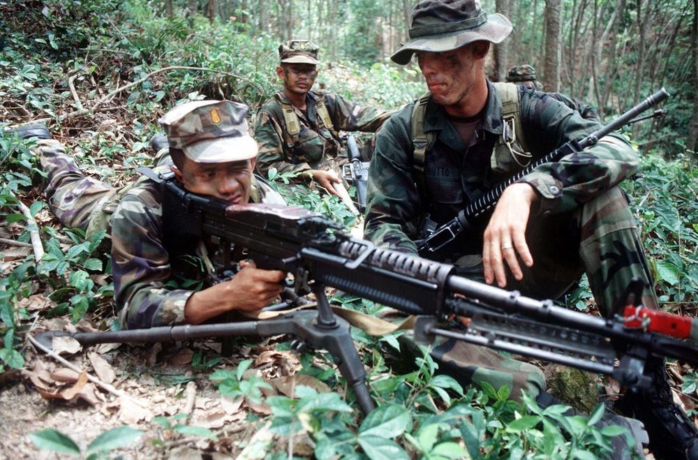 Royal Thai Marine Sgt. Arkom Jaiwijit sights-in on his M-60E3 Machine Gun.