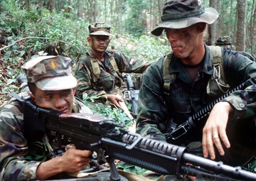 Royal Thai Marine Sgt. Arkom Jaiwijit sights-in on his M-60E3 Machine Gun.