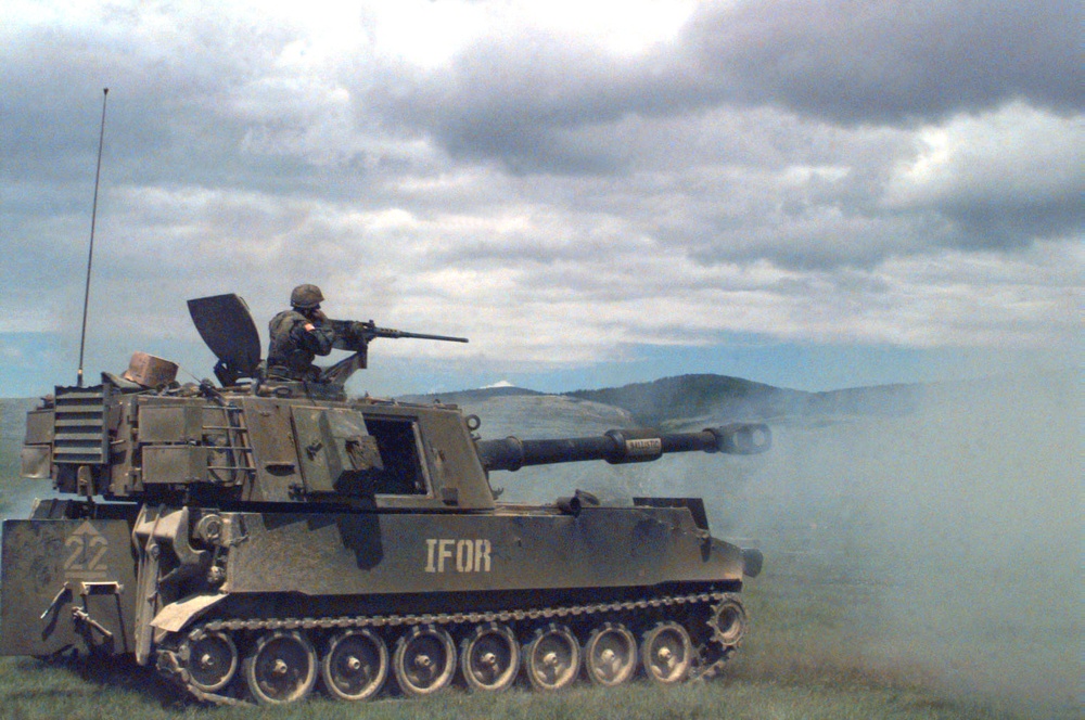 Sgt. Drake watches rounds during a live fire exercise near Glamoc, Bosnia and Herzegovina.