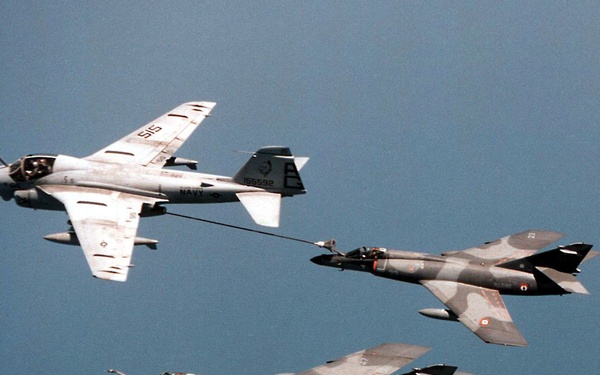 U.S. Navy A-6E Intruder refuels a French Navy Super Etendard.