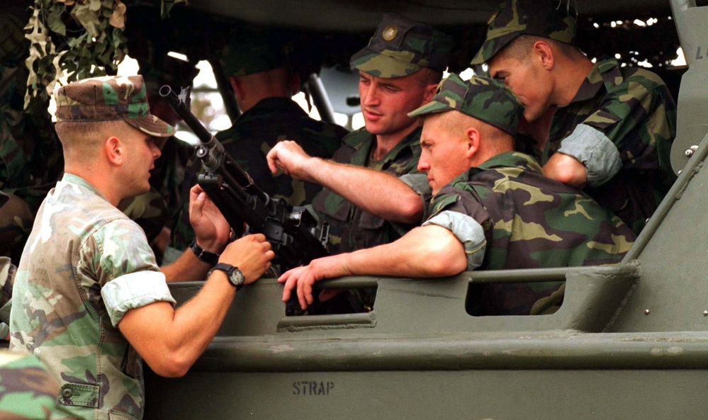 U.S. Marine explains how a M240G machine gun operates.
