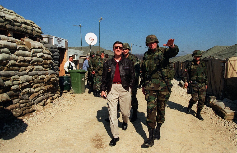 Commander, Task Force 1-26 Infantry gives a base camp tour to Secretary of Defense Cohen.