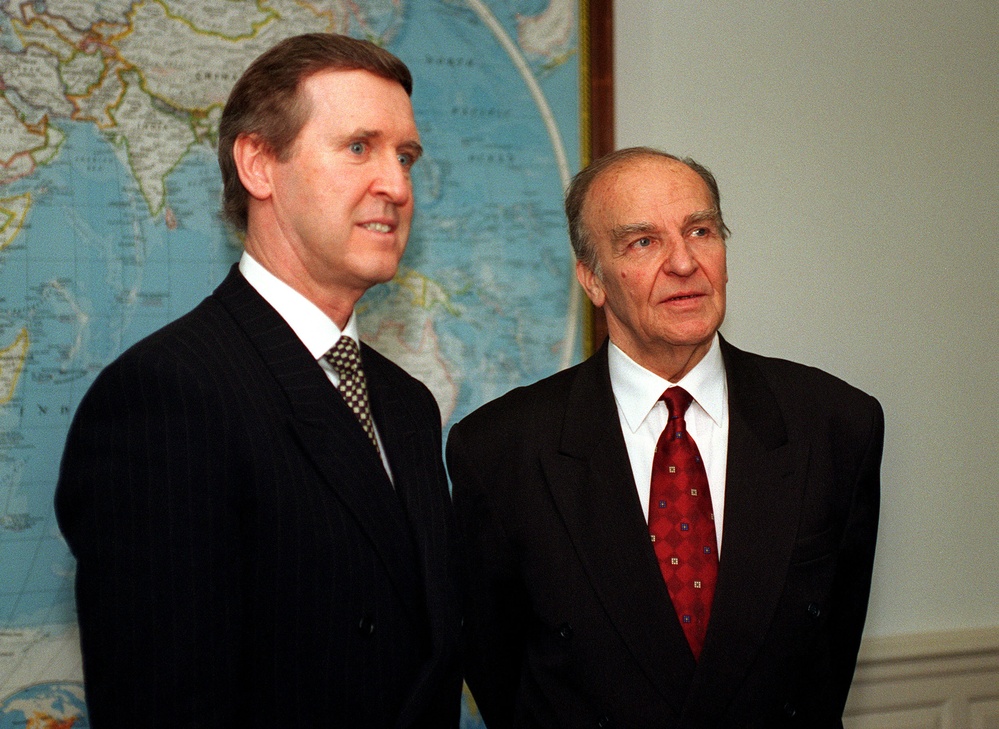 Secretary of Defense Cohen and President Izetbegovic listen to a reporter's question.
