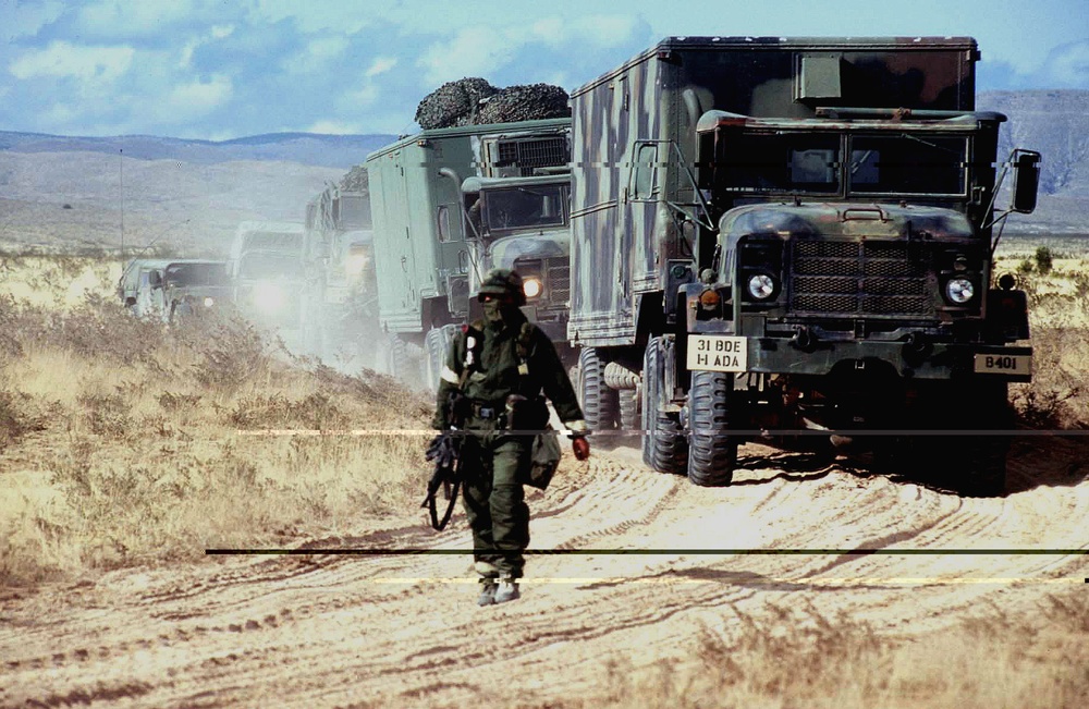 Vehicles of a Patriot missile battery are ground-guided to their next site.