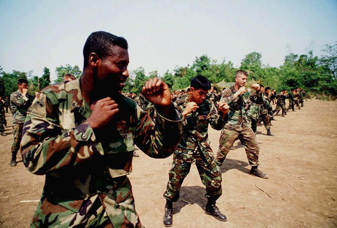 U.S. and Royal Thai soldiers train in hand-to-hand combat in Tak, Thailand.