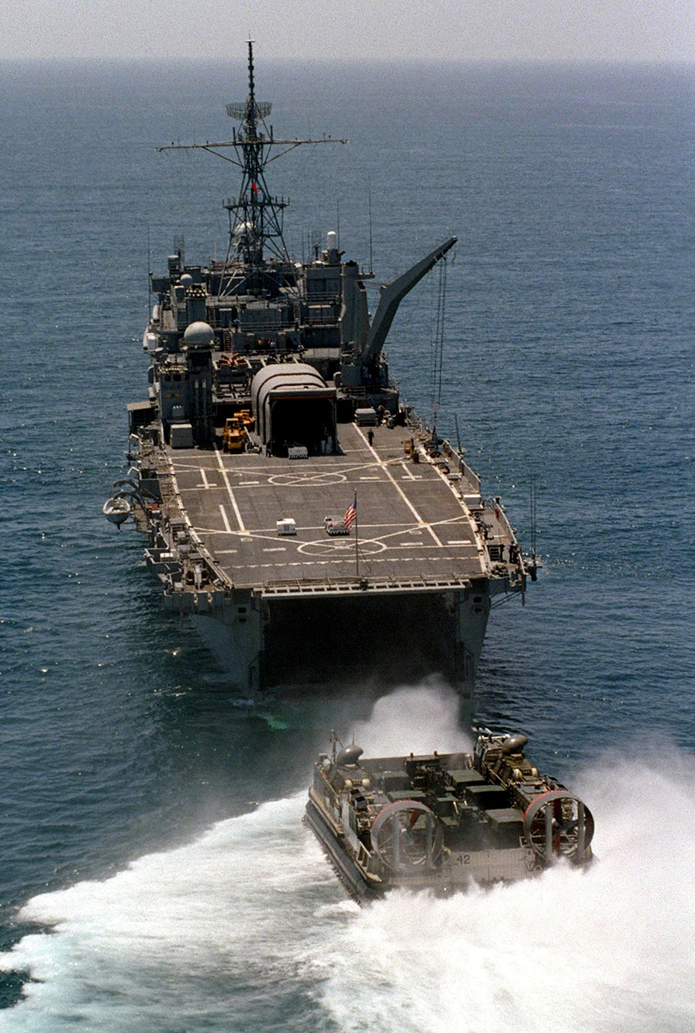 U.S. Navy LCAC lines up to enter the well deck of the USS Denver.
