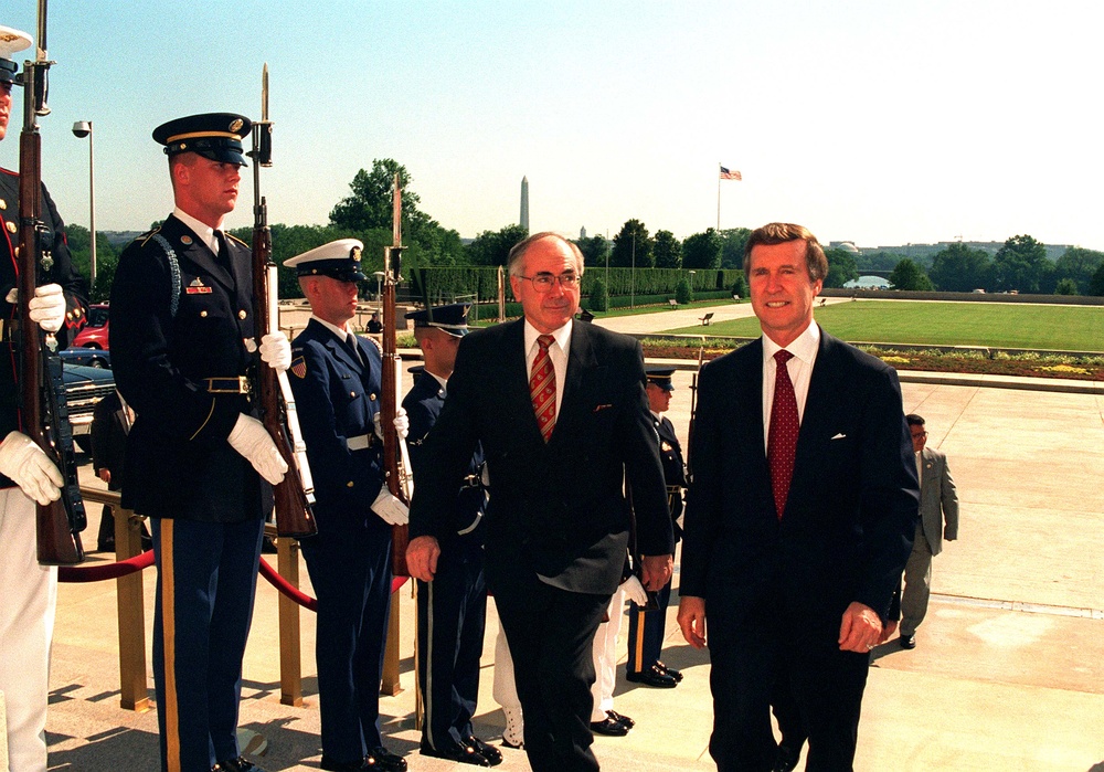 Secretary Cohen escorts Prime Minister Howard into the Pentagon.