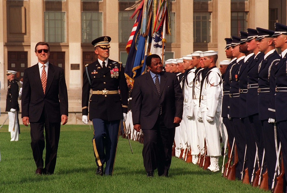 Minister of Defense Modise of South Africa inspects the honor guard at the Pentagon.