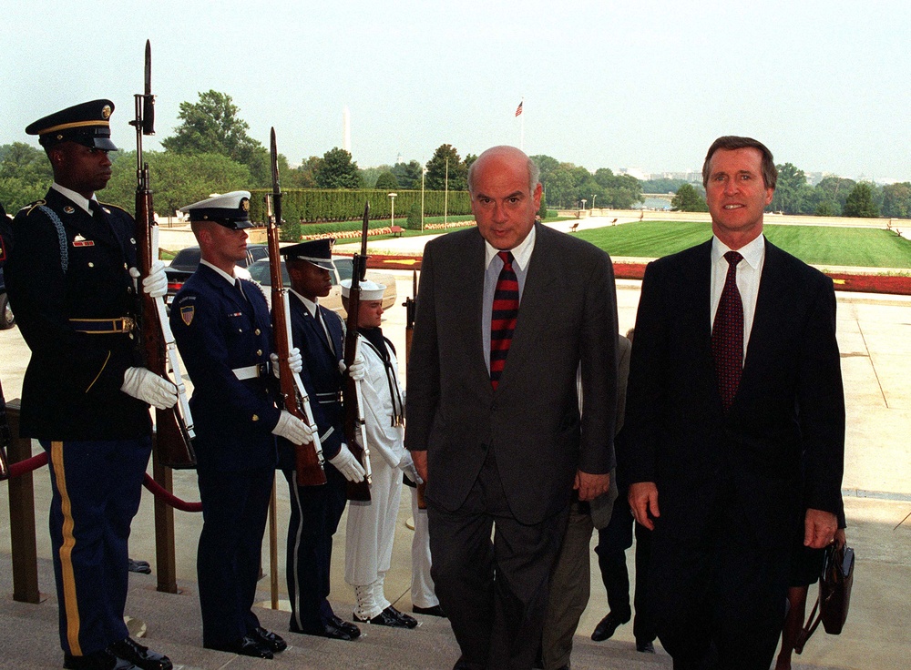 Secretary Cohen escorts Minister Insulza into the Pentagon.