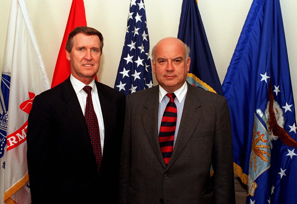 Secretary Cohen and Minister Insulza pose for photographs prior to their meeting.