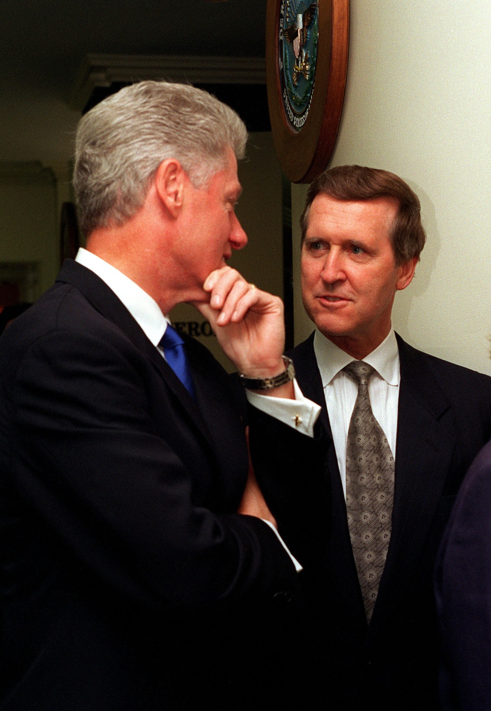 Secretary of Defense William S. Cohen talks with President Bill Clinton at the Pentagon.