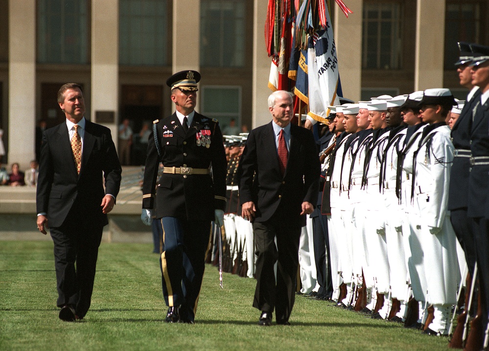 Senator McCain, Secretary Cohen inspect the ceremonial honor guard at the Pentagon.