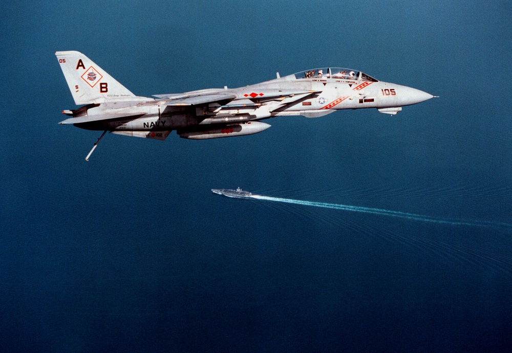 Navy F-14B Tomcat prepares to land on the USS George Washington in the Persian Gulf.