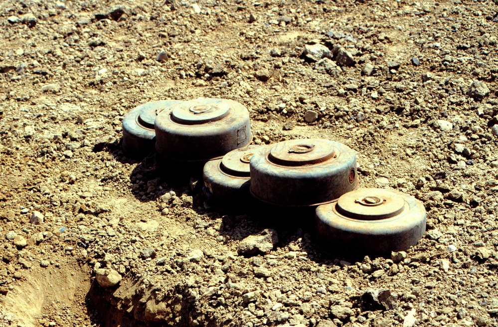 Anti-tank land mines are stacked for destruction at Guantanamo Bay.