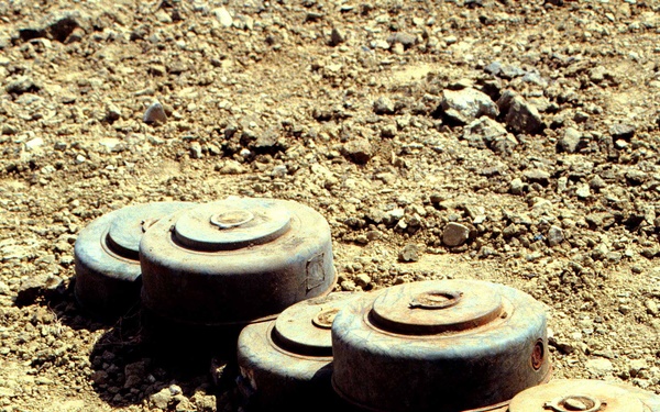Anti-tank land mines are stacked for destruction at Guantanamo Bay.