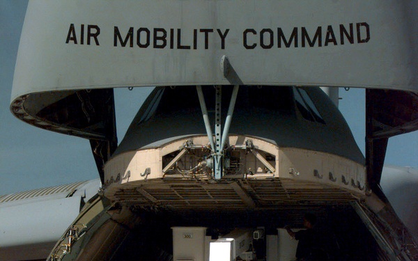 Air Force C-5 Galaxy delivers utility trucks to aid Guam after Super Typhoon Paka.