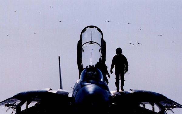 A Fighter Squadron 102 pilot gives his F-14B Tomcat a pre-flight inspection.