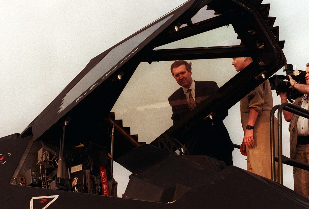 Secretary Cohen looks into the cockpit of a U.S. Air Force F-117A Nighthawk.