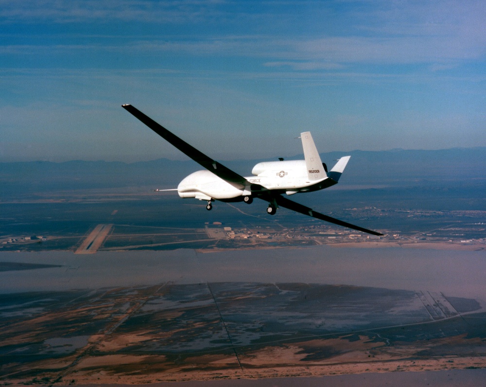 Global Hawk flies over Edwards Air Force Base, Calif., during its first flight.