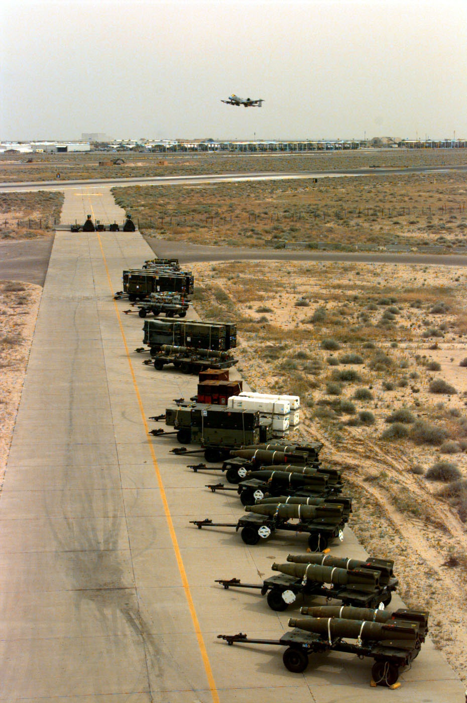 Bombs and missiles are pre-positioned for quick loading at Ahmed Al-Jaber Air Base, Kuwait.